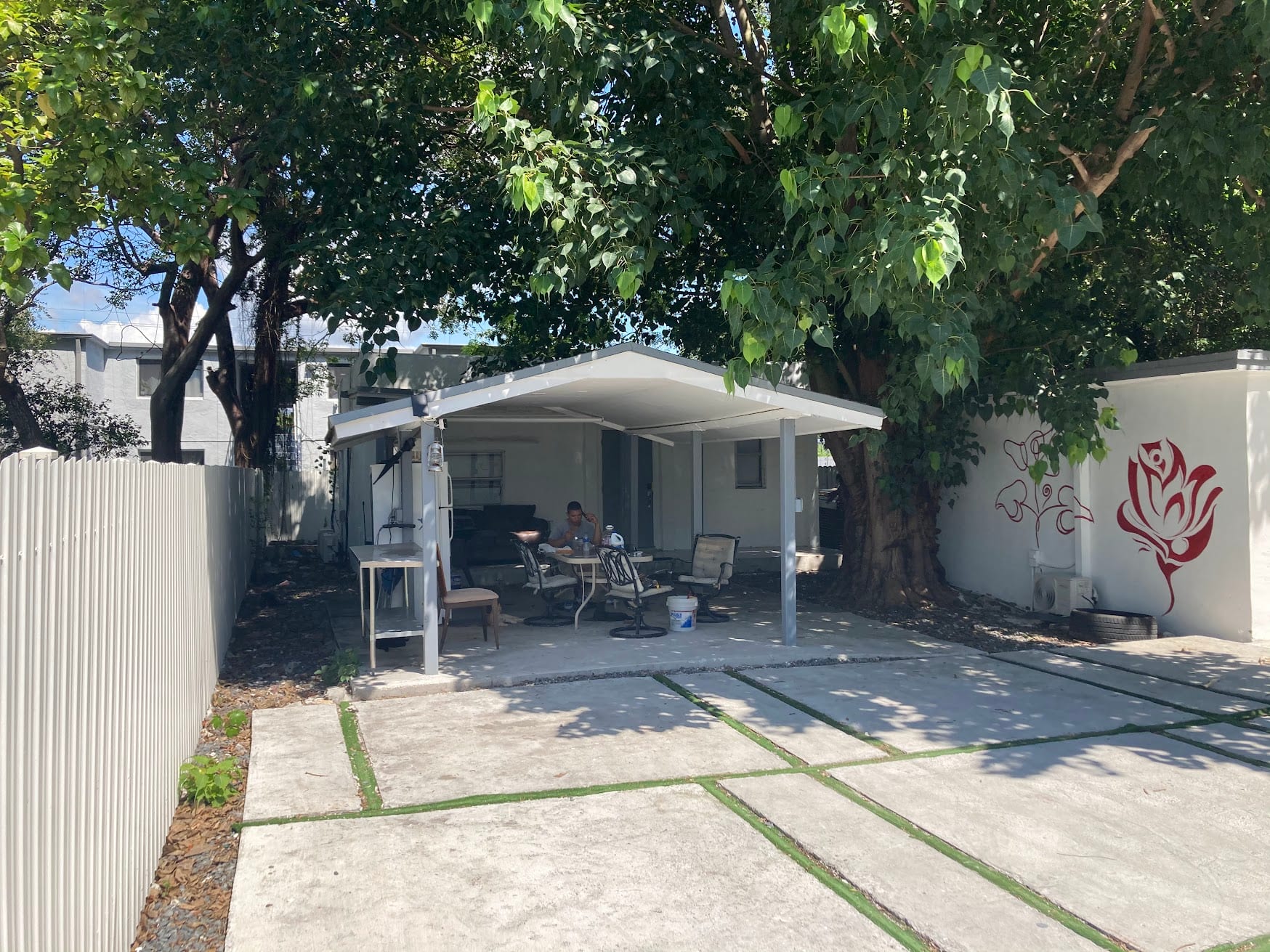 Completed covered patio and backyard outdoor living space in Hollywood, Florida