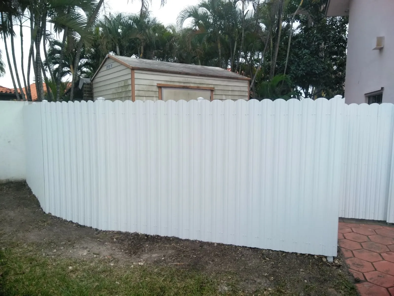 Side view of an outdoor kitchen masonry enclosure under construction in Hollywood, Florida