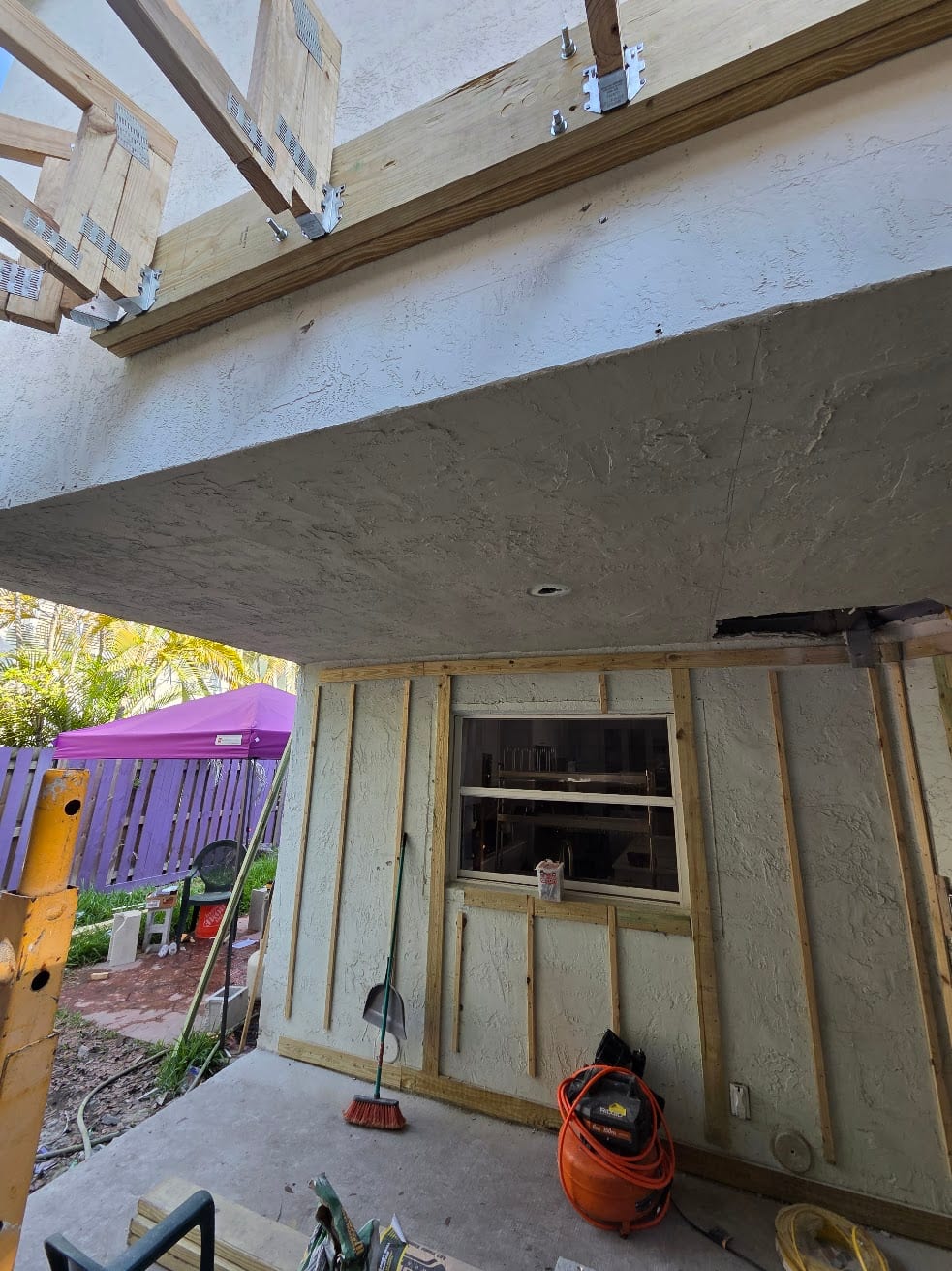 Wood pergola frame under construction in Hollywood, Florida